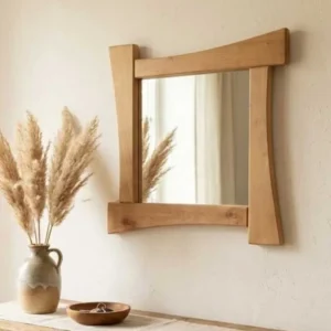 Miroir design en bois d'alisier massif au style artisanal et contemporain.